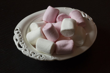 Marshmallows with a couple of christmas coffee cups