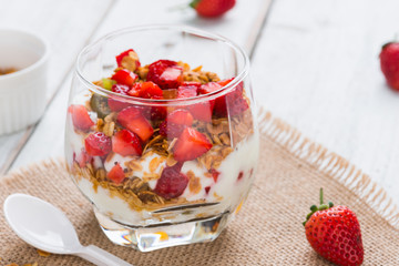 Strawberry , granola and yogurt healthy breakfast parfait