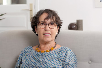 portrait of brunette mature woman with eyeglasses