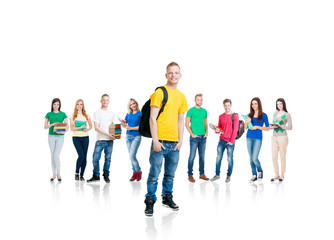 Obraz premium Large group of teenage students isolated on white background. Many different people standing together. School, education, college, university concept.