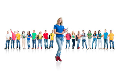 Obraz premium Large group of teenage students isolated on white background. Many different people standing together. School, education, college, university concept.