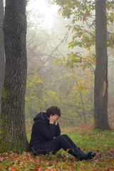 Fototapeta premium woman in depression in forest
