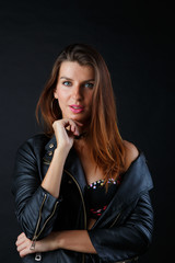 Fototapeta premium Long-haired brunette in lingerie, leather jacket