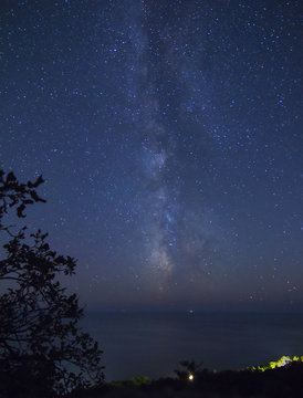 Starry night . The Milky Way over the sea.