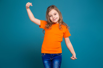 Cute little girl in tee shirt with brown hair