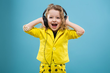 Cute young girl in earphones