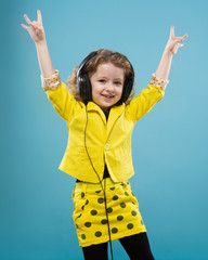 Cute young girl in earphones