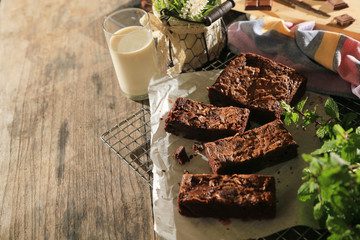 abstract topping chocolate brownies cake with milk and chocolate bar