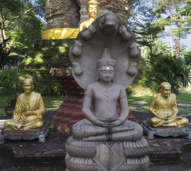 Statues in the garden at Wat Pansao Chiang Mai Lanna Thailand