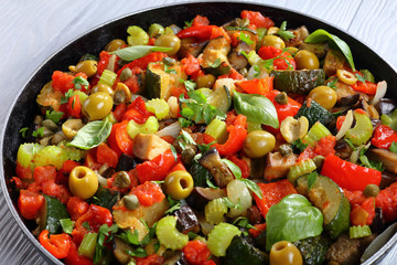Italian Caponata with vegetables on skillet