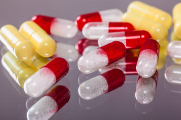 scattering the capsules and tablets