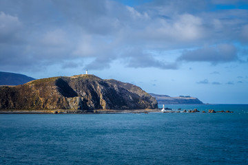 Lighthouse on cliffs near Wellington, New Zealand © daboost