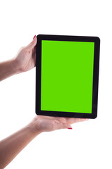 female hands on a white background holding tablet picture with depth of field, selective focus on the tablet