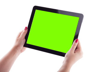 female hands on a white background holding tablet picture with depth of field, selective focus on the tablet