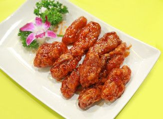 Sweet and sour pork in white plate.