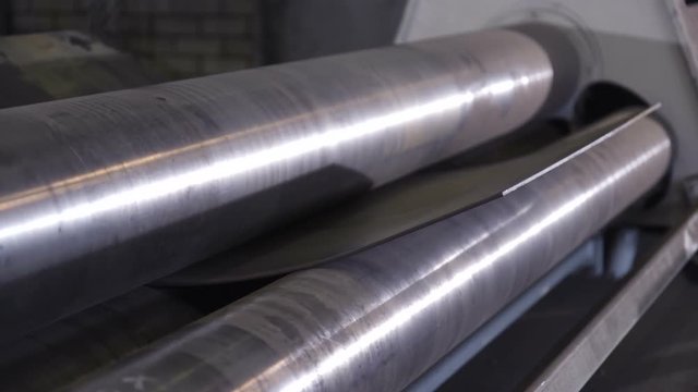 Machine bending sheet metal in an angle