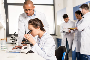 Fototapeta premium Female scientist at laboratory