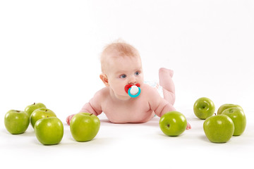 Fototapeta na wymiar small child with fruit