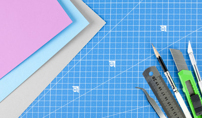 Concept of Architects workspace with plans and professional tools.