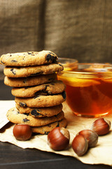 Breakfast with a cup of black hot tea and fresh baking with chocolate and hazelnuts