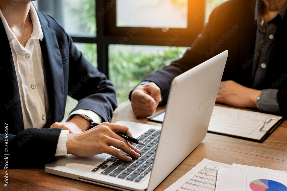 Poster businessman team working at office desk and using a digital computer laptop hands detail, computer a