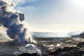 Eruption of a volcano on the Hawaiian island on the ocean. Volcanic activity. Tourism. Field of frozen black lava © Todayphoto