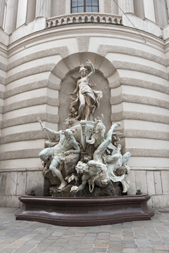 Fountain with a group of figures on the outside of the Michaelertrakt, Hofburg, Vienna