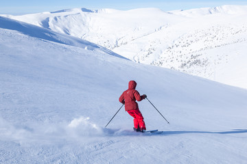 Skiing in the snowy mountains.