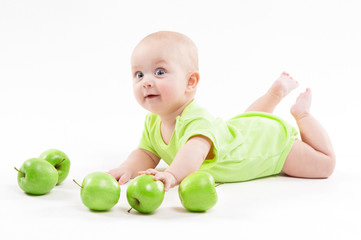 Fototapeta premium cute baby lying on the background and smiling
