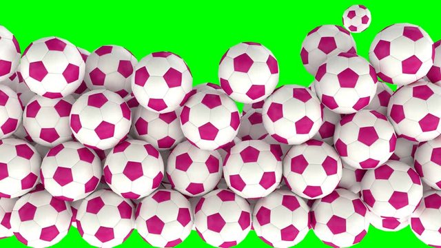 Animated a lot of simple soccer balls with plain white and pink material falling and tumbling filling up container against green background. Front camera view.