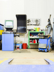 tyre repair equipment in a car repair station