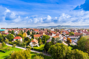 Naklejka premium Europe culture concept - panoramic city skyline birds eye aerial view under dramatic sun and morning blue cloudy sky in Rothenburg, Germany