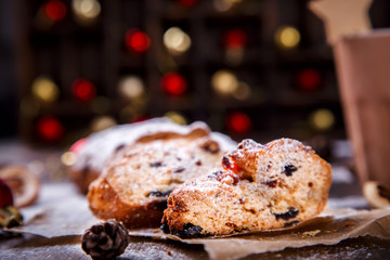 Christmas or New Year pastries Holidays Concept Dresdnen Stollen is a Traditional German Cake Gift Fruit Cake for the Holiday European festive dessert Tradition of Decoration Background