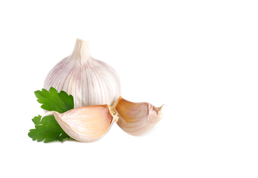 Fresh garlic bulb and garlic clove isolated on white background
