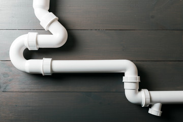 white plastic sewerage water pipes - obrazy, fototapety, plakaty
