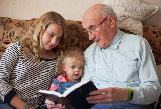 generations reading a book