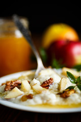 sweet milk oatmeal with apples, nuts and honey