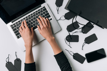 woman typing on laptop