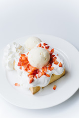 Strawberry Cream Toast on the white plate and white table.