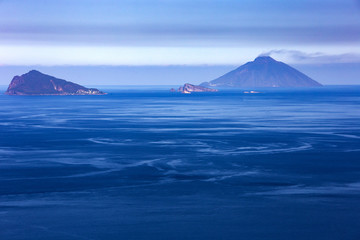 Aeolian archipelago close to Sicily. Sunny day, blue sky and Mediterranean sea. Volcano island.