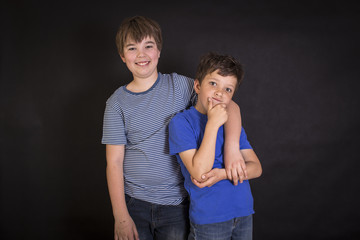 Happy boys portrait, the laughing brothers.
