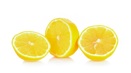 Lemon and cut half slice isolated on white background