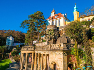 Portmeirion's Vibrant Details: Colorful Urn and Balustrade in Welsh Sunlight