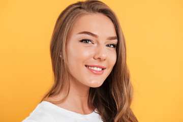 Close up portrait of a pretty smiling girl