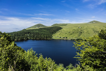 View of Lake Guery. Lake Guery is a mountain lake of volcanic origin located in Monts Dore, in the heart of the Massif Central. It is the highest of the Auvergne lakes. Auvergne-Rhone-Alpes. France.