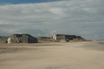 Remains of the Atlantic Wall at the beach of Thyboroen in Denmark. Built during WW2 the bunkers...