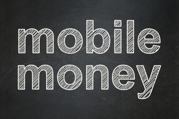 Fototapeta premium Banking concept: text Mobile Money on Black chalkboard background