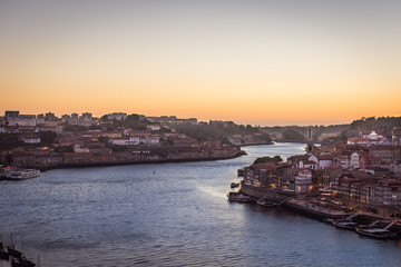 Fototapeta na wymiar Sunset in Porto, Portugal with a view of the river Duero