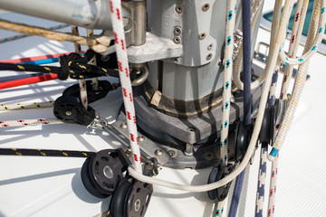 Pulleys and ropes, sheets and halyards or cleats on a yacht. Sailors world, sailing boat equipment....