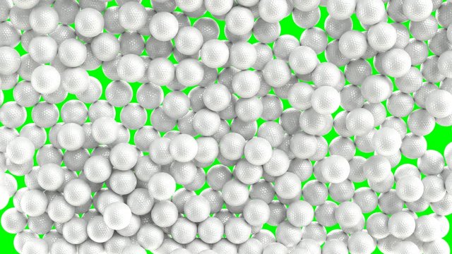 Animated a lot of white plain Golf balls falling and tumbling against green background. Top camera view.